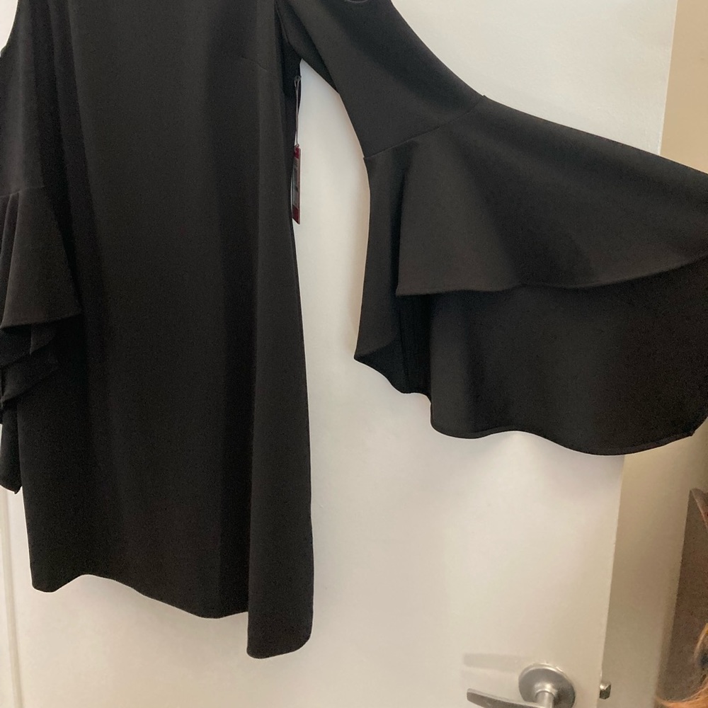 Black cold shoulder dress , with bell sleeves.